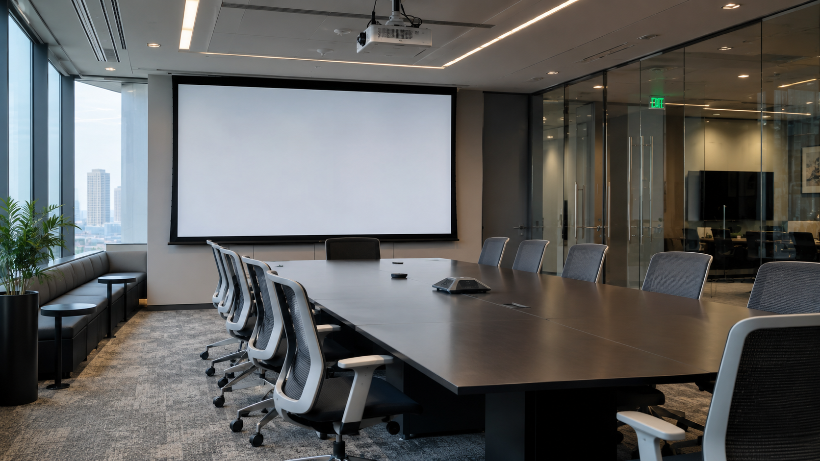 Modern corporate conference room with a clean conference table, windows, and projector screen